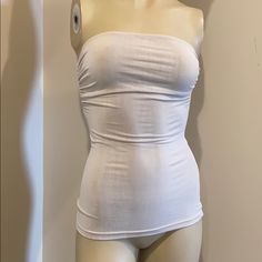 Super Fun Strapless Top Light Weight Size S/P Lightly Ruched On Sides To Give It A Sexy Look Color Light Gray Fast Shipping Bundle And Save Happy Poshing White Bandeau Tank Top, White Fitted Tube Top With Built-in Bra, White Seamless Bandeau Tank Top, White Bandeau Top With Built-in Bra, White Seamless Strapless Tank Top, White Seamless Sleeveless Tube Top, White Seamless Tube Top, White Stretch Bandeau Tops, Strapless Fitted Tank Top For Beach