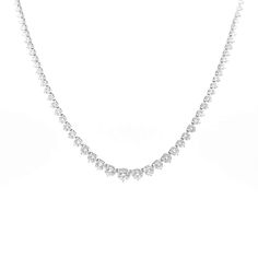 It's time to treat yourself to the one you've always wanted. Whether with a white tee or a gala dress this piece will impress. Our graduated tennis necklace made with 96 diamonds in a total of 20.38ct t.w round cut diamonds. Set in 18K White Gold. With Insert Clasp with fold-over security closure. 18K Gold: 28.38gr Diamonds: 5.18ct - 144 pieces /8.66 - 117 / 20.38cts - 96 pieces Clarity: SI1 - SI2 Color: G Length: 16 in Width: 3.5mm - 8.5mm Available in White Gold Natural, untreated gemstones Co Gala Dress, Appointment Book, Jewelry Website, Curated Design, Tennis Necklace, Gala Dresses, White Tee, Round Cut Diamond, Precious Metals