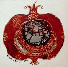 a red and white wall with a mirror in the shape of a pomegranate