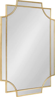 a gold framed mirror with an arched design on the top and bottom edge, in front of a white background