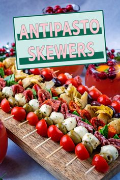 A board full of antipasto skewers with a text overlay title.