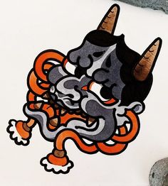 an image of a dragon with horns on it's head and eyes painted on the side of a wall