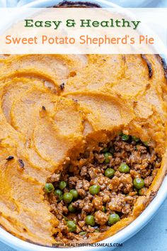 easy and healthy sweet potato shepherd's pie with peas in the middle, on a blue background