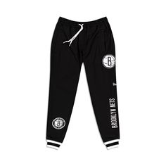 The Brooklyn Nets Logo Select Jogger features a chenille applique Nets logo and embroidered wordmark at the left leg with an alternate team logo at the right ankle. Fabric: 52% polyester, 42% cotton, 6% spandex Casual Black Bottoms With Logo, Athleisure Cotton Bottoms With Logo Print, Cotton Athleisure Bottoms With Logo Print, Sporty Logo Sweatpants For Streetwear, Streetwear Cotton Bottoms With Logo Print, Cotton Logo Print Bottoms For Streetwear, Cotton Streetwear Bottoms With Logo Print, Black Cotton Joggers With Logo Print, Cotton Bottoms With Logo Print For Streetwear