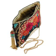 A Must Have this season! This statement bag showcases iconic individuality at its peak. Dress up or down, this bag will be your best friend. Also available inFrida's Flowers Crossbody Phone Bag and Frida's Flowers Crossbody Wallet. DIMENSIONS: 9.5 x 0.5 x 7", Crossbody Chain Strap, Zipper Closure, Fits a Cell Phone Bohemian Summer Evening Clutch, Beaded Crossbody Clutch, Bohemian Evening Crossbody Shoulder Bag, Bohemian Embroidered Shoulder Bag For Evening, Bohemian Embroidered Evening Shoulder Bag, Bohemian Crossbody Shoulder Bag For Party, Mary Frances Handbags, Spring Purses, Crossbody Clutch Purse