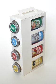 a white box with four different types of cans in it