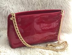 Due Fratelli Genuine Leather Burgundy Red Handbag Clutch Made in Canada Genuine Leather Handbag Evening Clutch with gold tone chain. Black lining, one inside zipped pocket. Genuine Burgundy Red Laque Leather Closure: With zipper. Excellent vintage condition. Measure: 10'' L x 6 1/2'' H x 3''W We take care of your choice. Your purchase will be carefully wrapped and placed in a box to prevent breakage. IMPORTANT: If you wish to buy more then 1 item, please ask me about combined shipping. IMPORTANT Chic Red Evening Bag With Chain Strap, Elegant Red Evening Bag With Chain Strap, Red Evening Bag With Gold-tone Hardware, Red Evening Bag With Chain, Red Evening Bag With Gold-tone Hardware For Formal Events, Burgundy Bags With Chain Strap For Formal Occasions, Evening Burgundy Shoulder Bag With Chain Strap, Formal Burgundy Bags With Chain Strap, Red Handbag