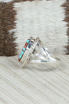 This turquoise, spiny oyster and sterling silver inlay ring was made by Navajo silversmith Sandra Parkett. The inside of the band is signed and stamped sterling.Size: 8Length: 7/8"Width: 7/8"Free shipping on all orders! We ship with USPS and always include tracking. All orders ship within a day of payment.Returns are accepted up to 30 days after you receive your order. Just send us a message. Our shop offers cash back or store credit. The item must be returned in new condition. Western Style Rings With Inlay For Gift, Western Style Turquoise Ring With Sterling Silver Inlay, Western Style Sterling Silver Turquoise Inlay Ring, Silver Turquoise Ring With Inlay, Traditional Silver Turquoise Ring With Inlay, Western Style Turquoise Inlay Ring In Sterling Silver, Southwestern Sterling Silver Opal Ring, Luxury Sterling Silver Turquoise Ring With Inlay, Santi Dimingo Inlay Jewelry Navajo