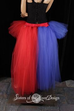 "Monster half and half high low tulle tutu skirt! Stand out and put a unique twist into your look. be your own crazy squad! This high low tulle skirt is handmade from hand cut panels of 50+yards of soft smooth bridal tulle. The tutu is split in have with red on one side and half royal blue on the other. We make the skirt with a very full tutu in the front that is 3 layers and then the back is another three layers in half and half for the colors. All Tulle is tightly machine gathered, surged and Wedding Bustle, Harley Cosplay, High Low Tulle Skirt, Bridal Squad, Tulle Tutu Skirt, Tulle Tutu, Half Skirt, Moon Design, Tutu Skirt