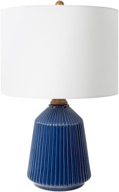 a blue lamp with a white shade on it