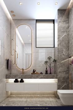 a modern bathroom with marble walls and flooring, along with a large round mirror above the bathtub