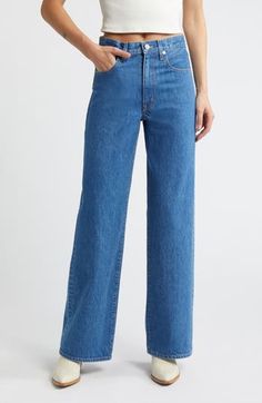 Crafted from Italian stretch denim in Los Angeles, these casual-cool jeans feature a superhigh waist and full-length wide legs for a contemporary look. 32" inseam; 21" leg opening; 12" front rise; 15" back rise (size 29) Zip fly with button closure Five-pocket style 100% cotton Machine wash, tumble dry Made in the USA of imported fabric High Waist Wide Leg Jeans, Cropped Wide Leg Jeans, Raw Hem Jeans, Wide Legs, Wide Leg Jeans, Bottoms Pants, Stretch Denim, Clothing Items, Leg Jeans