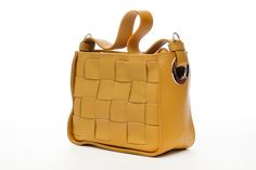 ❤ Product Name: Woven Leather Bag ❤ Color: Mustard ❤ Quality: Top-Quality Italy Accessories  ❤ Outside Material: Mustard Braided Calfskin ❤ Inside Material: Cotton Lining ❤ Bag Dimensions: L 22 x d 10 x h 18 Cm or L 8.6 x D 3.9 x H 7.08 inches ❤ Material: Braided Leather, Woven Leather, Genuine Leather, Inside Cotton Lining Woven Leather Sling Bag - Handmade Crossbody Purse -  Italian leather shoulder bag - Women bag to use every day - Gift for her This bag is made with the Italian craftsmanship and durable quality.  This bag is closed with a zipper and there is only one compartment. The calfskin leather material of this bag makes it worth buying and it has a shoulder strap.  You will have a chic style bag and it has silver color accessories.  It is completely handmade and will be shipped Yellow Office Shoulder Bag With Adjustable Strap, Modern Crossbody Flap Bag With Handles, Rectangular Flap Bag With Handles For Everyday, Everyday Tote Flap Bag With Handles, Everyday Rectangular Flap Bag With Handles, Trendy Everyday Crossbody Bag, Everyday Rectangular Bag With Detachable Handle, Everyday Flap Shoulder Bag With Handles, Daily Shoulder Bag Satchel With Handles