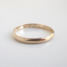 a gold wedding band with the words, i am not afraid to see in this photo