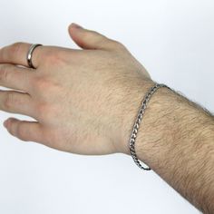 A minimalist, classy, and timeless 4mm curb stainless steel chain bracelet that will not tarnish or rust over time, even when worn in the water. 💎Free shipping on all orders💎Waterproof and non-tarnish💎Packaging that is ready to offer as a gift💎Customizable and adjustable chain length A durable, waterproof, and non-tarnish silver chain bracelet This stainless steel handmade chain bracelet is not only waterproof but also resistant to tarnishing and will maintain its shine over the years. You c Classic Cuban Link Silver Bracelet, Everyday Minimalist Cuban Link Bracelet, Minimalist Cuban Link Bracelet For Everyday, Minimalist Cuban Link Bracelet, Classic Cuban Link Metal Bracelet For Everyday Wear, Classic Cuban Link Metal Bracelet For Everyday, Classic Metal Cuban Link Bracelet For Everyday, Everyday Minimalist Tarnish-resistant Cuban Link Bracelet, Classic Cuban Link Bracelet With Stainless Steel Clasp