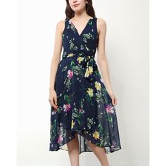 Beautiful Faux Wrap Dress By Donna Karan New York Navy Blue With Colorful Floral Print Flowy Shear Chiffon Overlay Surplice V Neckline Hidden Back Zipper Fabric Bow Tie Belt Dresses Up Or Down For Fashionable Versatility Approximate Measurements (Taken Flat): Length: To Lining Hem- 35 Inches To Longest Side Of Overlay- 45 Inches Pit To Pit- 17 Inches Waist- 15 Inches New To Poshmark? Use Code Spahrkstyles When You Sign Up To Get $10 Off Your First Order! Tags- Spring Summer Flowy Chiffon Floral Blue Floral Print Georgette Dress, Chic Blue Georgette Dress, Spring Blue Georgette Maxi Dress, Blue Georgette Maxi Dress For Spring, Sleeveless Floral Print Georgette Maxi Dress, Floral Print V-neck Georgette Maxi Dress, Sleeveless Georgette Maxi Dress With Floral Print, Blue Floral Print Knee-length Chiffon Dress, Blue Knee-length Chiffon Dress With Floral Print