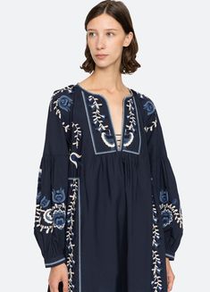 The Inga embroidered dress features long puff sleeves, deep v-neckline and floral embroidery throughout. Details: self-100% cotton lining-100% cotton embroidery-100% polyester slip on designed for a relaxed fit style #AW24-028 model is 5'10'' and wearing a size S Sea New York Clothing, Folk Clothing, Summer Mood, Long Kimono, Cotton Embroidery, Tunic Styles, Long Puff Sleeves, Mid Dresses, Clothing Care