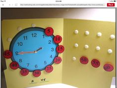 an open card with a clock and numbers on it