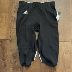 Men’s Adidas Football Hyped Cropped Pants Size Extra Large Black With White Accents Climalite Drawstring Nylon/Polyester/Spandex Material Measurements Are Approximate: 15 1/4” Across Waist Laying Flat 26”L Waist To Bottom Of Leg 12 1/2” Rise Pet& Smoke Free Home Original Price Includes Tax Black Training Bottoms With Pockets, Adidas Stretch Training Pants, Casual Adidas Outdoor Pants, Adidas Streetwear Bottoms With Built-in Shorts, Adidas Bottoms With Built-in Shorts For Streetwear, Adidas Athleisure Bottoms For Outdoor, Adidas Athleisure Outdoor Bottoms, Adidas Sporty Outdoor Bottoms, Adidas Outdoor Athleisure Bottoms