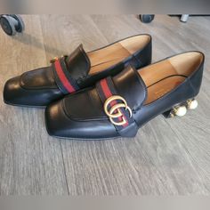 This Gucci Loafers Have Been Worn Literally 3 Times Only And Not Even More Than 2 Hrs Of Wear Each Time. It's Still In Very Good Condition. With Just An Unnoticeable Mark On One Of The Pearls. Will Add More Pictures Once I Get Back To My Place. Size 6.5 Color Black Brand Gucci Comes With A Box And Dust Bag/S Bought These At Neiman Marcus. Will Update For More Details Elegant Black Loafers With Contrasting Heel, Gucci Formal Low Heel Shoes, Designer Court Shoes With Round Toe For Workwear, Gucci Leather Low Heel Heels, Gucci Leather Heels With Low Heel, Gucci Leather Low Heel Shoes, Gucci Leather Low Heels, Gucci Almond Toe Heels For Office, Gucci Round Toe Heels For Office