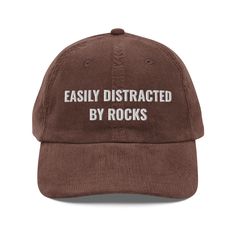 Easily Distracted By Rocks Hat, Geology, Geology Hat, Geology Gifts, Geologist Student, Geology Student Gifts, Vintage Corduroy Cap Hat Step up your style with an embroidered old-school cap. It's crafted from 100% cotton corduroy that's soft to the touch and comfy to wear. It features an adjustable strap with a gold-colored buckle for a great fit and a visor to protect you from the sun and wind. Complete your look with this embroidered corduroy cap and rock a cool vibe all day long. * 100% cotto Embroidered Corduroy, Corduroy Cap, Chapeau Cowboy, Vintage Corduroy, Deep Winter, Embroidered Hats, Cow Boy, Rock A, Look At You