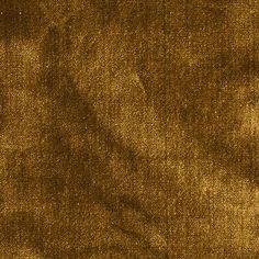 an image of a brown cloth textured with some sort of stain on the surface