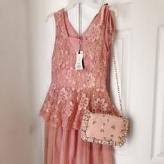 H&M Dress Nwt With Cute Embroidered Lace Purse Chain Was Faded Color A Bit But Still Cute I Never Used It Stay In The Closet For A While Dress Size 2-6 Will Fit V-neck Lace Dress With Floral Embroidery For Party, Feminine Embroidered Evening Dress, Feminine V-neck Lace Dress For Evening, Feminine Sleeveless Lace Dress For Evening, V-neck Floral Embroidered Lace Party Dress, Embroidered Lace Evening Dress, Elegant Floral Embroidered Lace Party Dress, Elegant Lace Dress With Floral Embroidery For Party, Elegant Party Lace Dress With Floral Embroidery