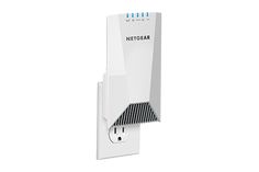 a white wall mounted phone charger next to an outlet for the netgear