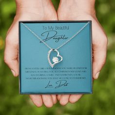 Free Shipping From a little girl I always knew you were destined for greatness. Watching you accomplish your goals will always bring a smile, and maybe even a tear. Wear this knowing you have me close to your heart.🥰 The dazzling Forever Love Necklace is sure to make your Daughter's heart melt! Pendant features a stunning 6.5mm CZ crystal surrounded by a polished heart pendant embellished with smaller crystals to add extra sparkle and shine. Beautifully crafted in white gold. A classic gift she Blue Jewelry For Best Friend Gift On Mother's Day, Inspirational Blue Jewelry For Gifts, Inspirational Blue Jewelry As A Gift, Blue Personalized Inspirational Jewelry, Destined For Greatness, My Beautiful Daughter, Clock Decor, Heart Melting, Gift Message