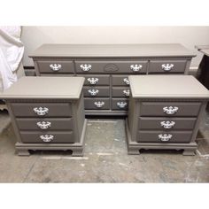 four dressers with drawers are sitting on the floor