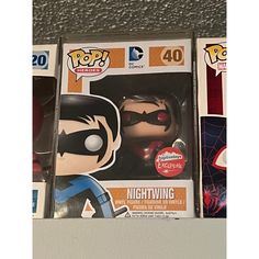 two pop vinyls are sitting on top of each other in the same box,