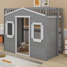 a child's bedroom with a loft bed and bunk beds for the children to sleep in