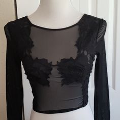 Its Brand New With Tag . Black Embroidery Over Black Net. Pretty Crop Top With Long Sleeves. Black Sheer Crop Top For Spring, Black Sheer Crop Top For Evenings, Spring Sheer Black Crop Top, Black Sheer Crop Top For Evening, Floral Embroidery Cropped Party Top, Black Sheer Cropped Top, Black Stretch Lace Crop Top, Black Tops With Floral Embroidery For Night Out, Black Top With Floral Embroidery For Night Out