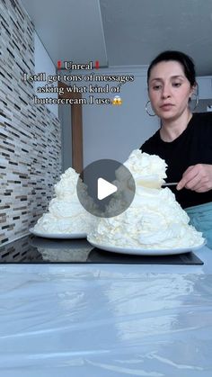 a woman is cutting into a cake with white frosting on it and the caption reads, what do you think?