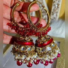 Beautiful Big Indian Jhumkas (Earrings) Not As Heavy As They Look But They Are Definitely A Bit On The Bigger Size..Msg Me For More Info/Details...Accepting Reasonable Offers. Luxury Bollywood Jhumkas With Pearl Drop, Bollywood Style Openable Jewelry For Celebration, Heavy Danglers For Celebrations, Red Chandbali Hoop Earrings With Latkans, Traditional Red Hoop Earrings With Latkans, Fusion Style Jhumkas With Latkans For Gift, Festive Dangle Jhumkas, Fusion Kundan Jhumkas For Party, Red Hoop Earrings With Latkans For Festivals