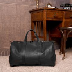 Handmade Black Leather Luggage Bag Travel Bag Hand Luggage For Travelling Leather Duffel Bag Classic Weekender Bag Gifts For Her Him This leather luggage is from our workshop and it's %100 handmade. When we made this bag, we used to cow leather. With this material you can use this bag for a long time. This lugggage has adjustable long strap. You can use it as crossbody bag too Also it is fit for cabin luggage at plane. There is one pocket with zip at inside and small pockets for wallets inside. Soft Leather Rectangular Duffle Bag For Daily Use, Rectangular Soft Leather Duffle Bag For Daily Use, Rectangular Soft Leather Satchel For Overnight Trips, Soft Leather Rectangular Bag For Weekend Trips, Rectangular Soft Leather Bag For Weekend Trips, Rectangular Bag With Smooth Grain For Overnight Trips, Rectangular Bags With Smooth Grain For Overnight Trips, Rectangular Travel Bag With Smooth Grain For Overnight Trips, Rectangular Travel Bag For Overnight Trips With Smooth Grain