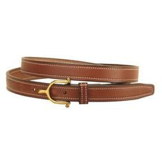 Made in the USA from premium, supple bridle leather, this Tory Leather " Brass Spur Buckle Belt features a buckle modeled after a classic English spur. Belt comes in a perfect width to fit most loops on breeches and jeans. Nicely finished with stitched edges. Buckle is sewn on. USA. Western Editorial, Dover Saddlery, Used Saddles, Gift Card Number, Buckle Belt, Winter Looks, Made In The Usa, Belt Buckles, Riding Boots