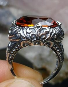 Simulated Orange Citrine Ring Scroll Design#90 Custom Made This is a brand new stunning Victorian inspired filigree ring in antiqued solid sterling silver. The flawless oval full cut Simulated/Man-made Orange Citrine gemstone is 16mm (5/8th of an inch) by 12mm (1/2 inch) in dimension... The inside of the band is marked 925 for sterling. Notice the beautiful filigree scroll craftsmanship of the silver setting. This lovely ring sits 10mm off the ring and measures 17mm NS on the finger. This is an Orange Citrine, Citrine Ring, Scroll Design, Mystic Topaz, Citrine Gemstone, Lovely Ring, Filigree Ring, Cz Ring, Engraved Items