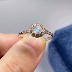 >>>> BASIC OPAL INFORMATION <<<< Round Opal : 5*5mm.Main stone: Natural good fire opal.Side stone: dainty cz diamond (cubic zircon).Material: 925 Sterling Silver +Natural opal stone.Metal color: silver, gold, rose gold. Metal materials: 925 sterling silver, 18K rose gold Plated, 18K rose gold Plated.>>>> SIMPLE DESIGN AND GOOD FIRE <<<>>> CUSTOM METALS <<<< Ring Size: From US #2 to US #15.Supply customized Solid Gold (9K, 14K and Adjustable Elegant Opal Crystal Ring, Elegant Adjustable Opal Crystal Ring, Fine Jewelry Opal Promise Ring, Delicate Opal Gemstone Rings, Elegant Opal Crystal Ring With Birthstone, Elegant Opal Ring With Round Stone, Elegant Opal Birthstone Crystal Ring, Elegant Opal Crystal Ring, Opal Gemstone Jewelry For Promise