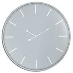 a clock with white hands and numbers on the face is shown against a white background