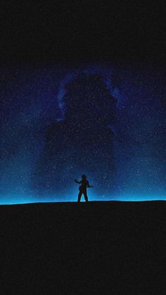 the silhouette of a person holding a baseball bat in front of a sky filled with stars