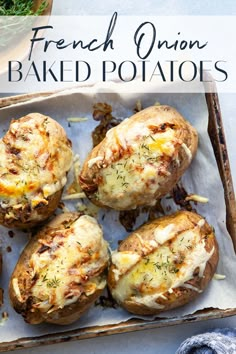 baked potatoes with cheese and herbs on top