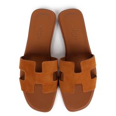 This pair of Oran sandals are in Naturel suede goatskin, with the iconic H cutout detail, Naturel leather goatskin insole, and natural leather soles.Origin: ItalyCondition: New and never worn - a small scratch on the bottom of one of the sandalsAccompanied by: Hermes box, dustbagsSize: 37 EU Designer Suede Closed Toe Sandals, Flat Heel Suede Sandals, Classic Brown Sandals With Suede Lining, Luxury Suede Closed Toe Sandals, Brown Closed Toe Sandals With Suede Lining, Designer Suede Sandals With Round Toe, Luxury Closed Toe Suede Sandals, Classic Suede Sandals, Luxury Summer Sandals With Suede Lining