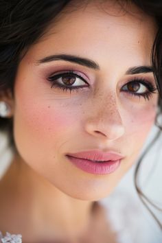 Bring out the best in your brown eyes with wedding makeup designed to enhance their natural richness and depth. Click for inspiration here.