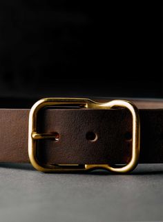 Emil Erwin in Nashville spent years on their signature belts — designing the proprietary buckle, perfecting the fit, and sourcing the highest quality leather and hardware from American companies. the end result is practical, timeless, and guaranteed for life. each belt is hand-edged, burnished, sewn, and finished in th Luxury Men's Belt Buckles For Workwear, Luxury Men's Belt With Tang Buckle, Men's Luxury Vintage Belts, Luxury Men's Semi-formal Belt Buckles, Luxury Classic Belts With Brass Hardware, Luxury Classic Belts With Metal Logo, Luxury Men's Belts For Office, Luxury Classic Belt With Metal Logo, Luxury Classic Men's Belts