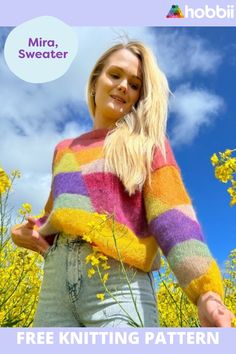 a woman standing in a field of yellow flowers with her hands behind her back to the camera