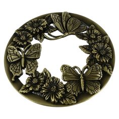 a metal object with flowers and butterflies in it's center, on a white background