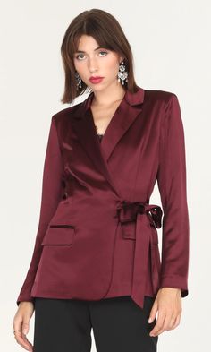 For minimal effort with maximum elegance, the Glenda Satin Side Tie Blazer is soon to become your new favorite. With subtle shoulder pads to help you feel put together and polished and a belt that can be tied or worn loosely, how you wear it is entirely up to you. Satin blazer   Side tie  Welt pockets  Tailored Light s Tie Blazer, Belly Shirts, Burgundy Blazer, Blazer Outfits For Women, Satin Blazer, Luxury Women Fashion, Blazer Outfits, Work Attire, Fashion Outfit