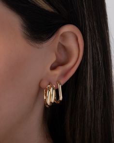 Chic and bold 14k Gold Double Twist Oval Hoops are a new twist on our classic oval hoops. Wear them to the office or for a night out, these hoop earrings are perfectly versatile. Sold as a Pair Size of hoop: Approx. 20mm(H) x 8mm(W) Total Weight: Approx. 3 grams Standard Production: 4-8 business days Rush Order Production: 3-6 business days Shipping: Select shipping method at checkout.2-Day Shipping and Overnight shipping available by request at checkout Shipped from our L.A. Studio. This item i Double Twist, Oval Hoop Earrings, Earring Sale, Personalized Necklace, Ring Bracelet, The Office, Ring Earrings, Necklaces Bracelets, Rush