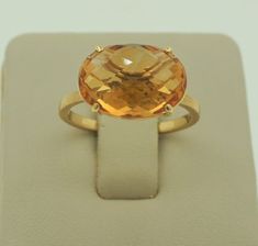 Stunning handmade 14K solid yellow gold oval cut natural citrine cocktail ring. Unique engagement statement ring. November birthstone. Made by Gabriel & Co. Beautiful gift for someone you love! Ring size: 6 1/2 (adjustable upon request). Ring width approx.: 1.8mm from the bottom of the ring and approximately 10mm from the top of the ring. Total citrine weight approx.: 5.05 ct. Total ring weight: 3.2 grams. Hallmarks: 14K 244199 Will be put in a box, perfect for gifting this beautiful, one of a k Luxury Yellow Topaz Ring For Gift, Future Style, Citrine Ring, Natural Citrine, November Birthstone, Dainty Bracelets, Unique Engagement, Ring Unique, Love Ring